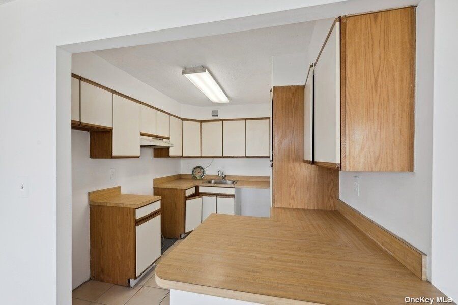 Property Photo: 10-34 166th Street 8C NY 11357