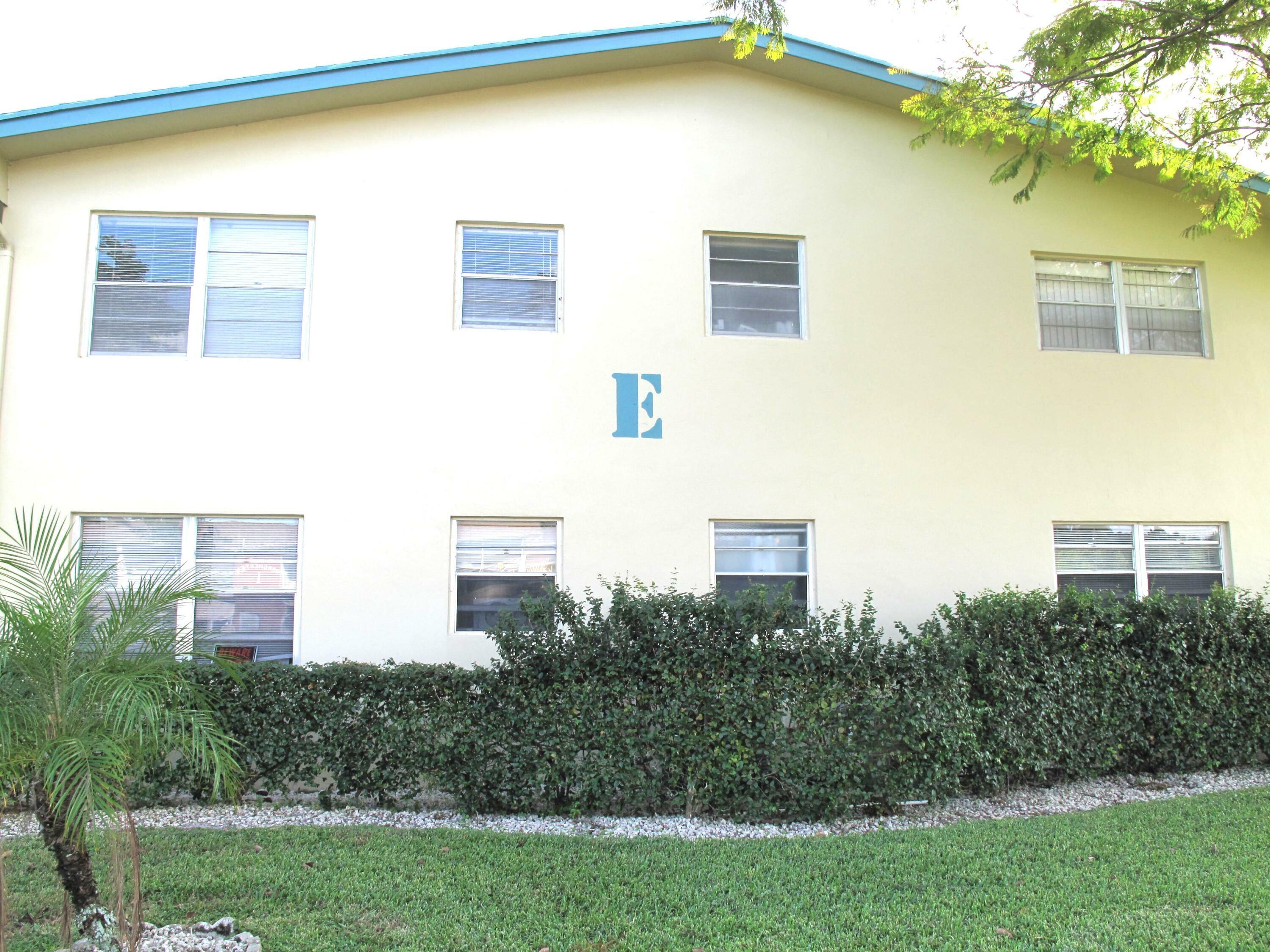 Property Photo:  107 Dorchester E  FL 33417 