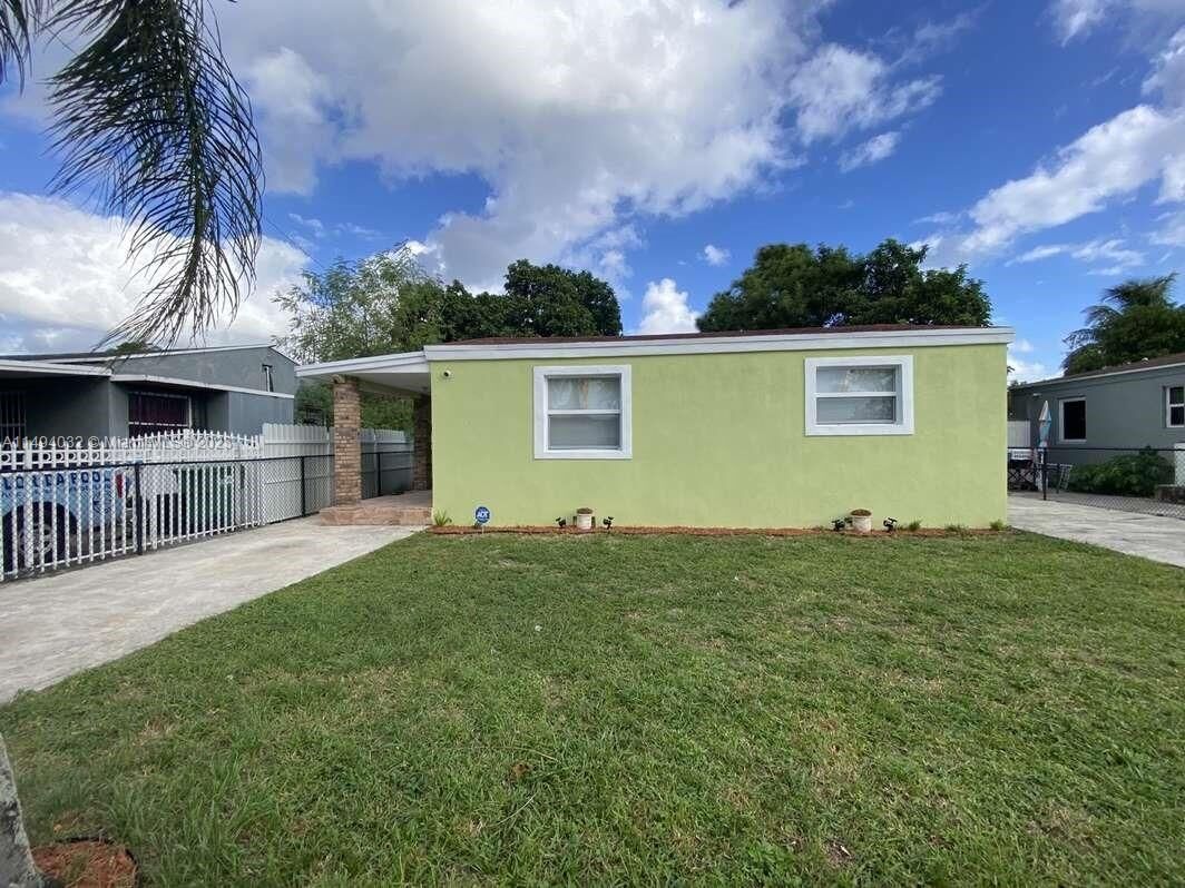 Property Photo:  1031 Atlantic Ave  FL 33054 