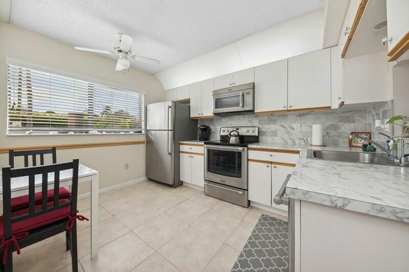 Property Photo:  15342 Lakes Of Delray Boulevard 94  FL 33484 