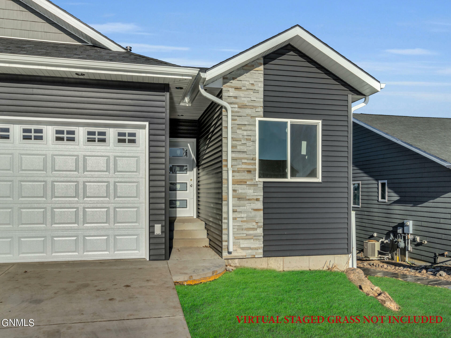 Property Photo:  3202 E Divide Avenue  ND 58501 