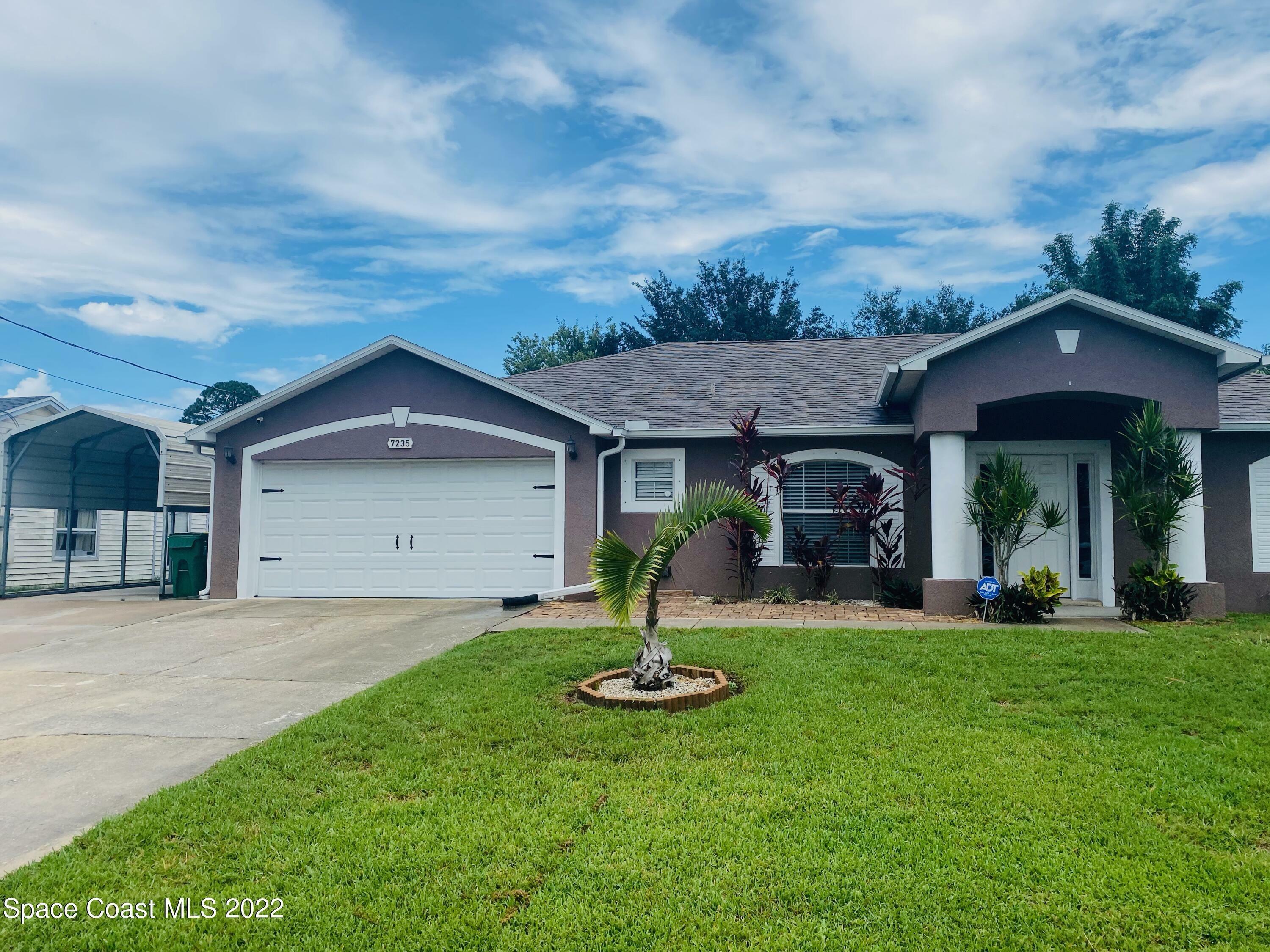 Property Photo:  7235 Ackerman Avenue  FL 32927 