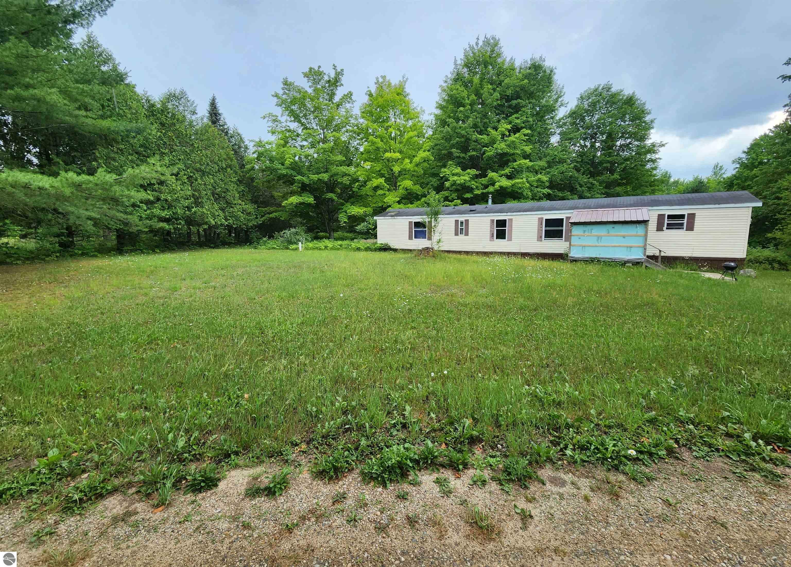 Property Photo:  1234 Bass Lake Road, SW  MI 49680 