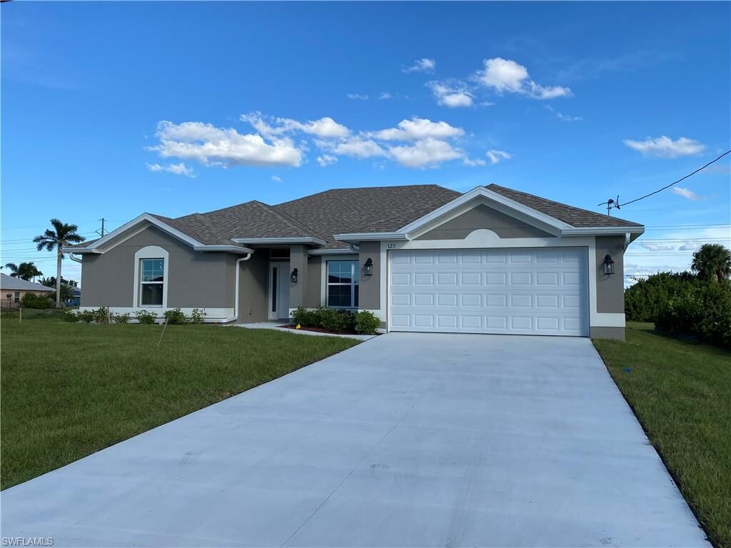 Property Photo: 123 NW 24th Pl FL 33993