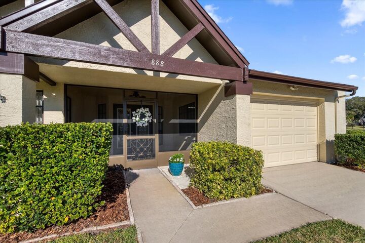 Property Photo:  888 Sutton Place  FL 34684 