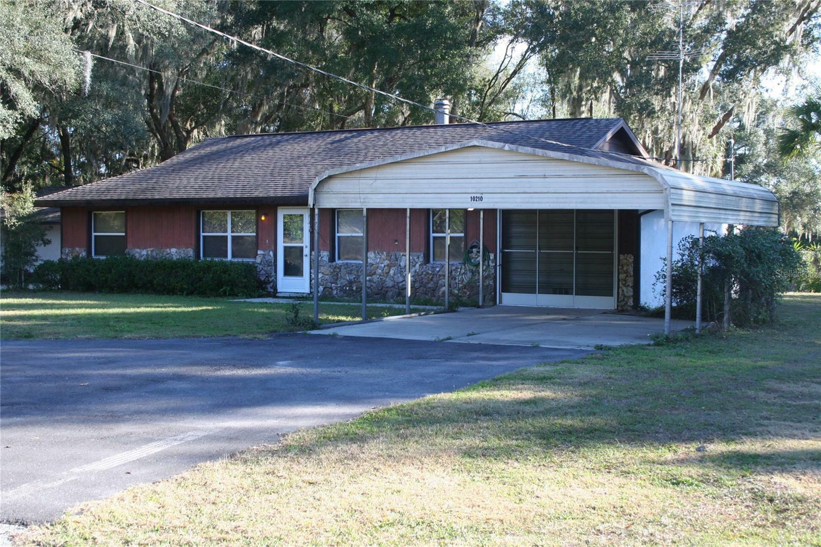 Property Photo:  10210 SE 138th Place Road  FL 34491 