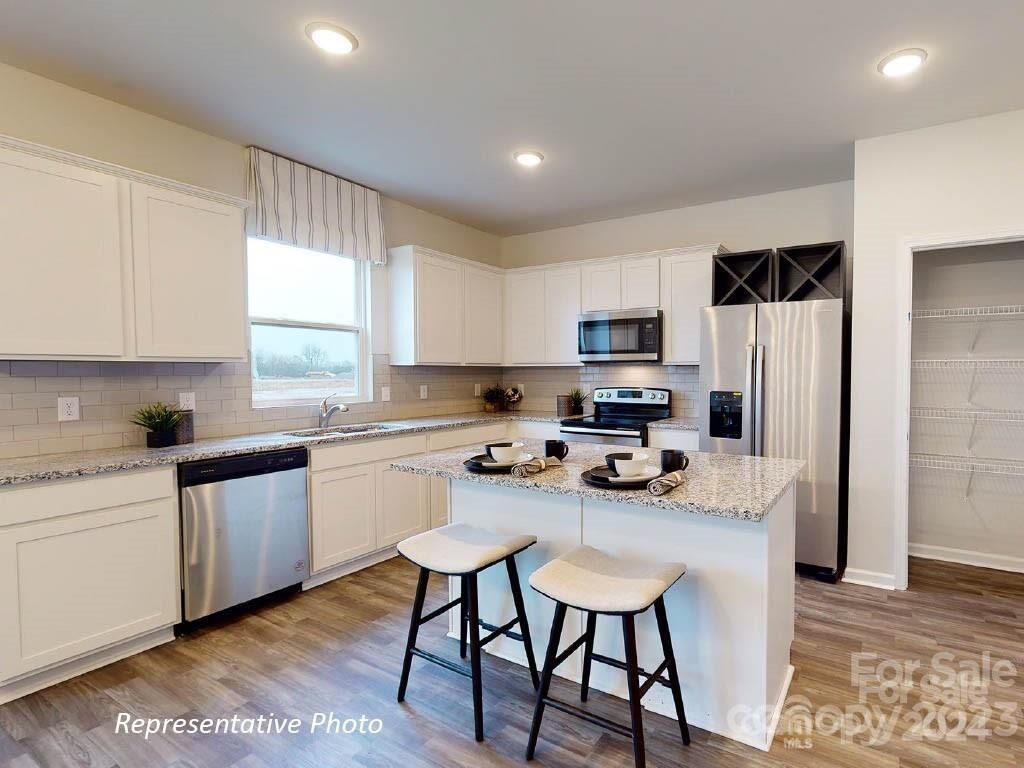 Property Photo: 2777 Luca Terrace SW 30 NC 28025