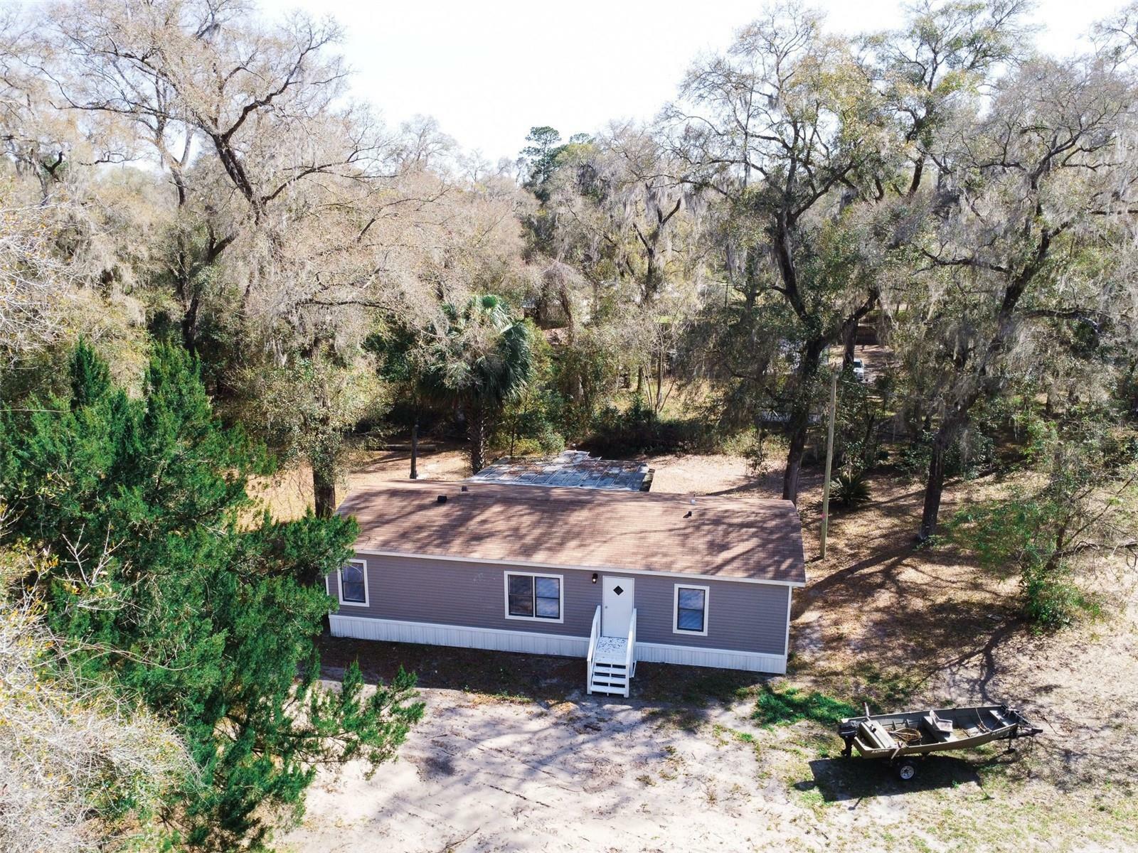 Property Photo:  15591 NE 150th Ter  FL 32134 