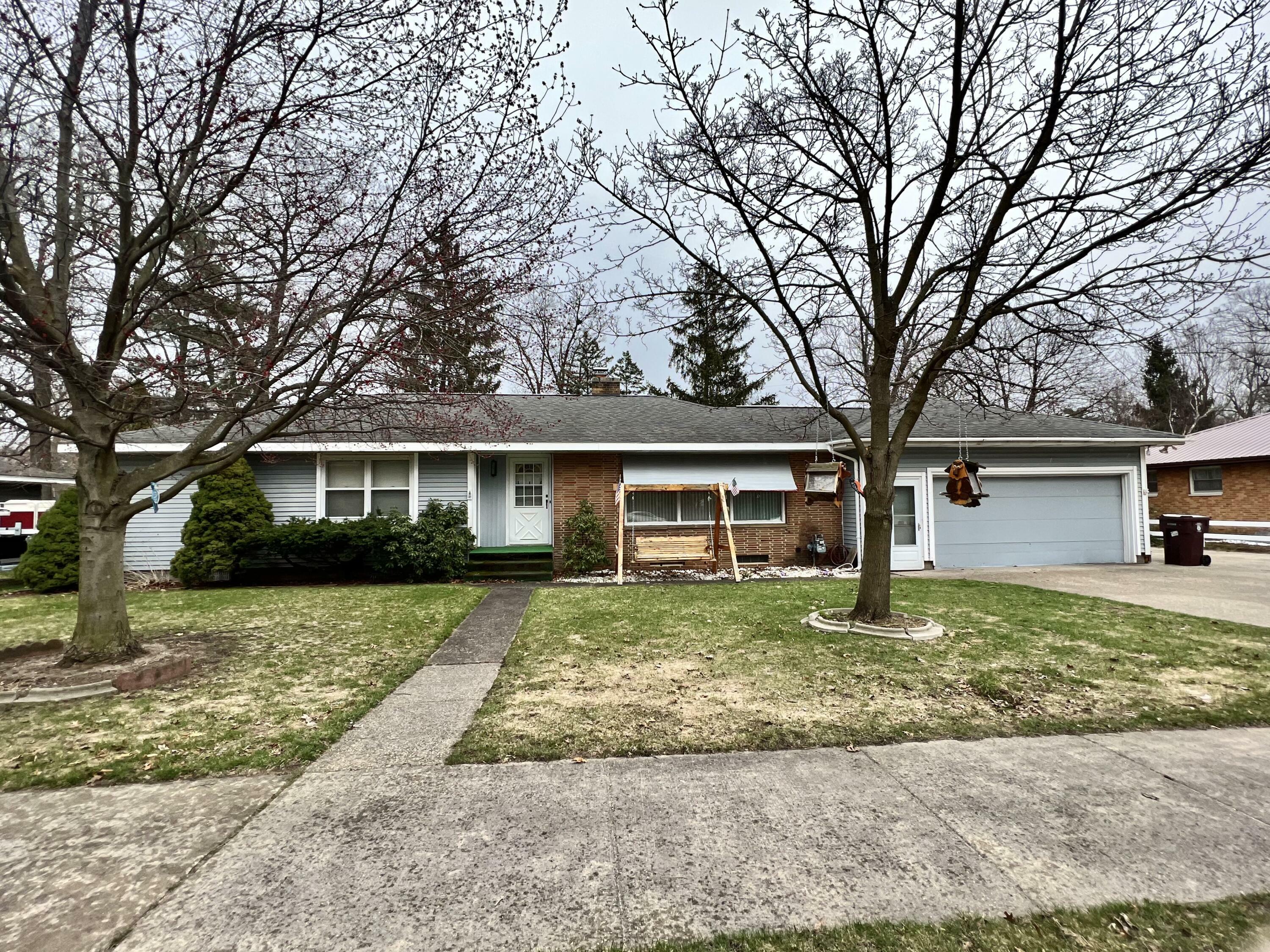 Property Photo:  744 S Quarterline Road  MI 49442 