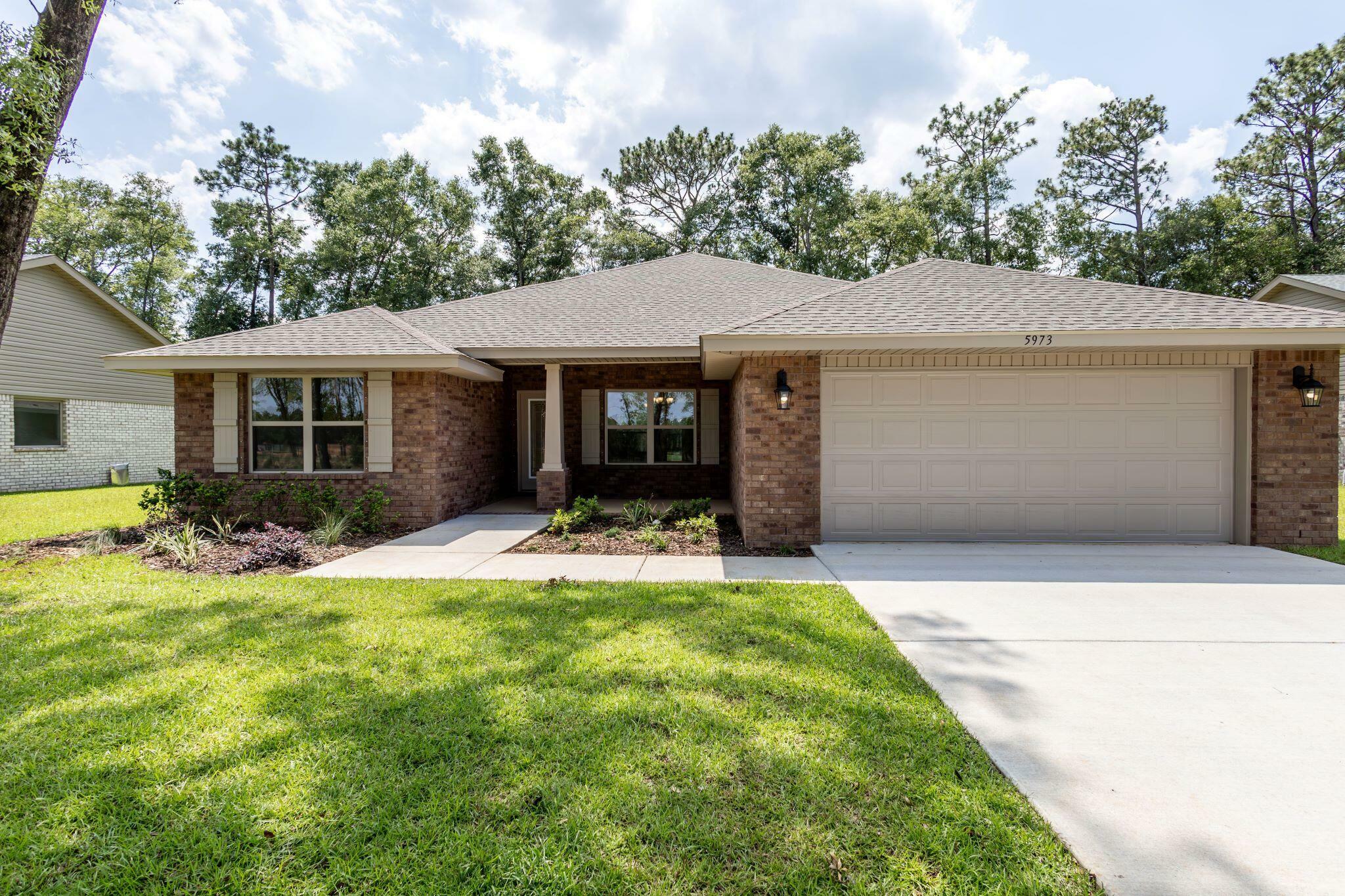 Property Photo: 5839 Crestlake Drive FL 32536