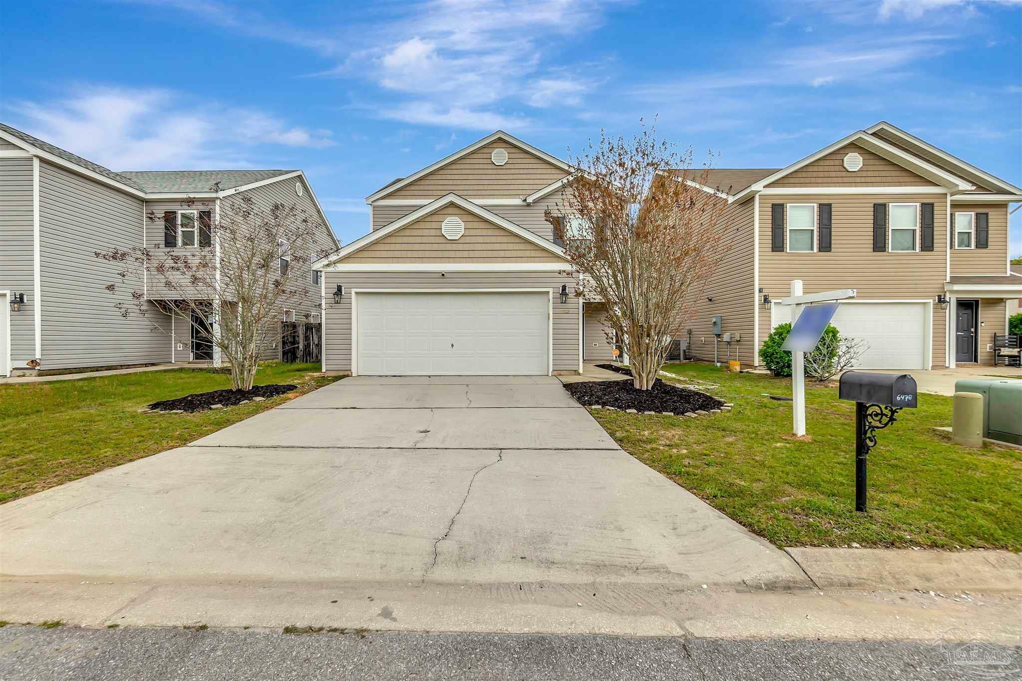 Property Photo: 6478 Flora Ct FL 32570