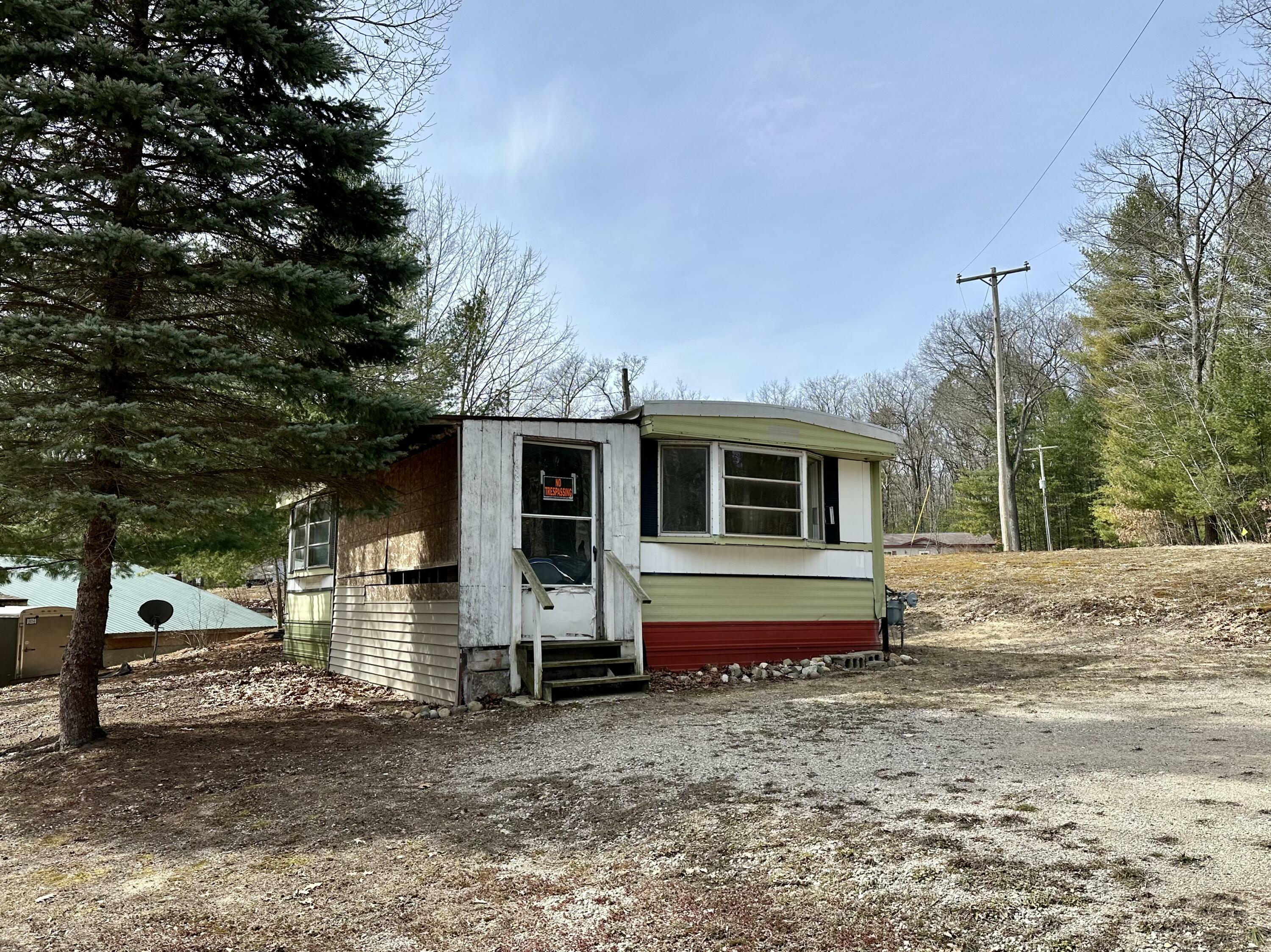 Property Photo:  1689 Topinabee Mail Road  MI 49721 