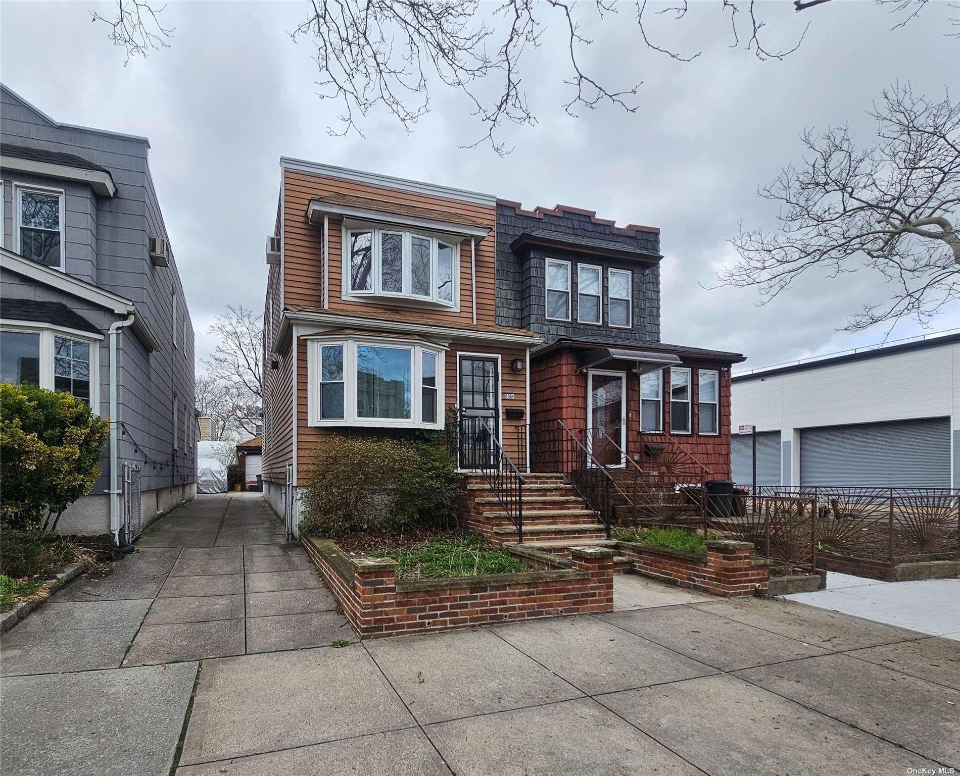 Property Photo:  69-04 67th Place  NY 11385 