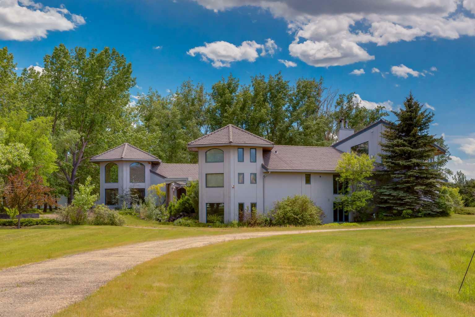 Property Photo:  280203 Township Road 235A  AB T1X 2C6 