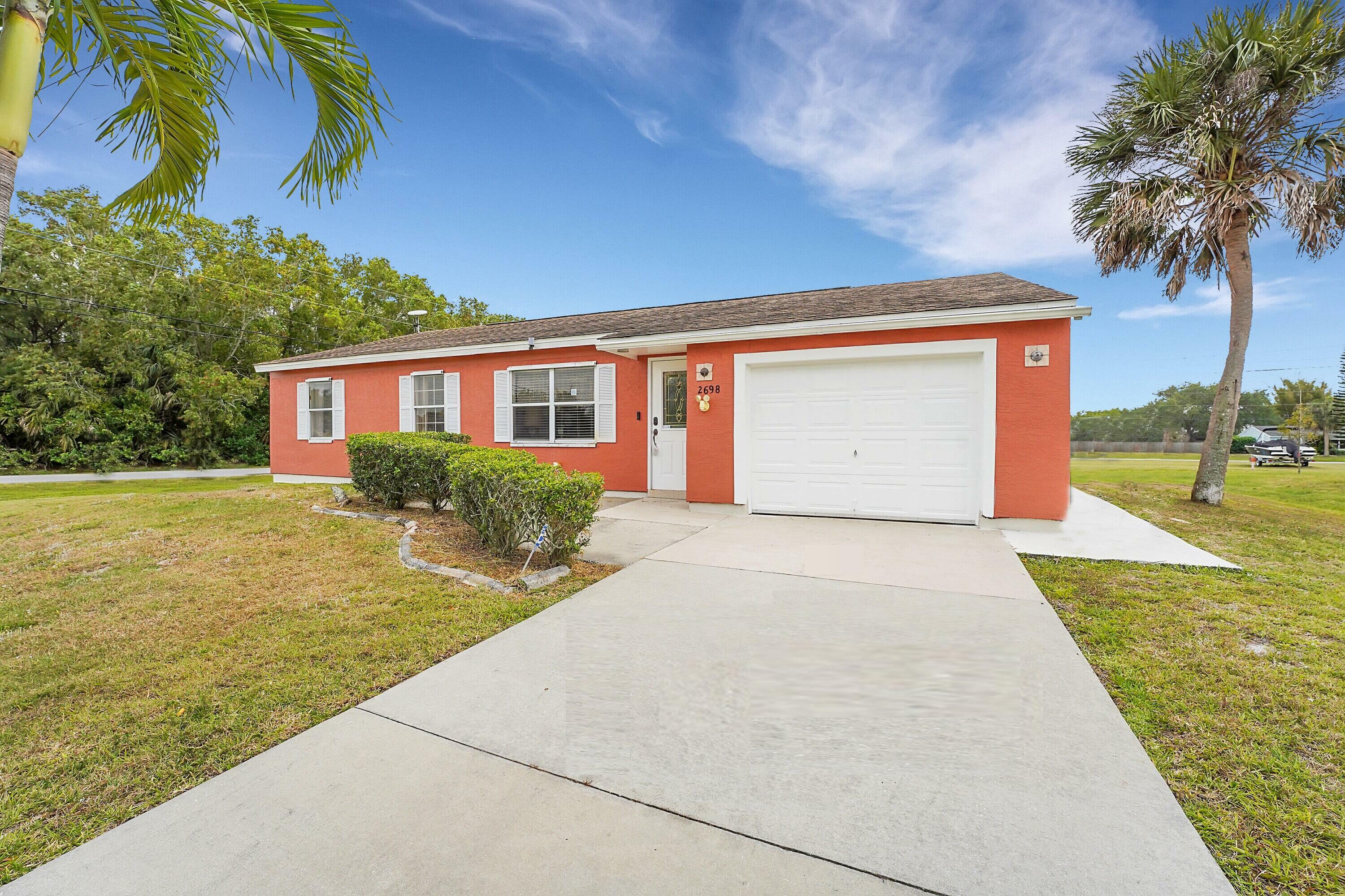 Property Photo:  2698 SE Melaleuca Boulevard  FL 34952 