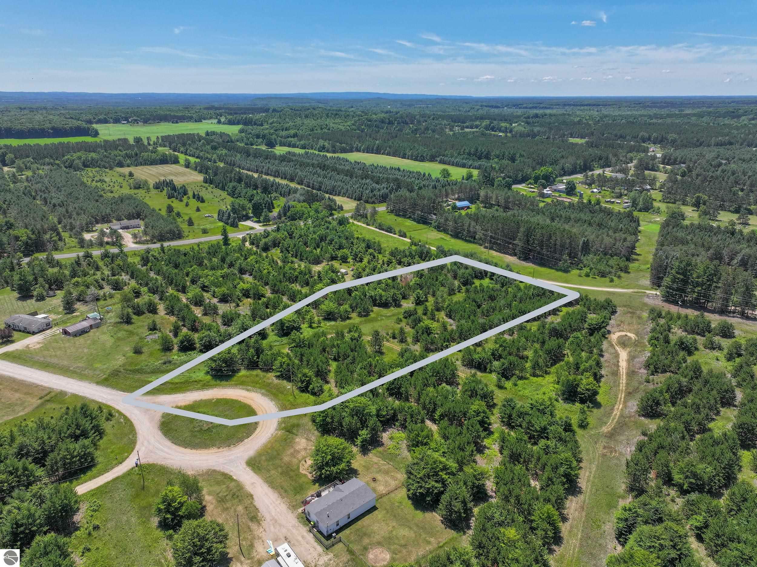 Property Photo:  Parcel F Country Pines Drive  MI 49649 