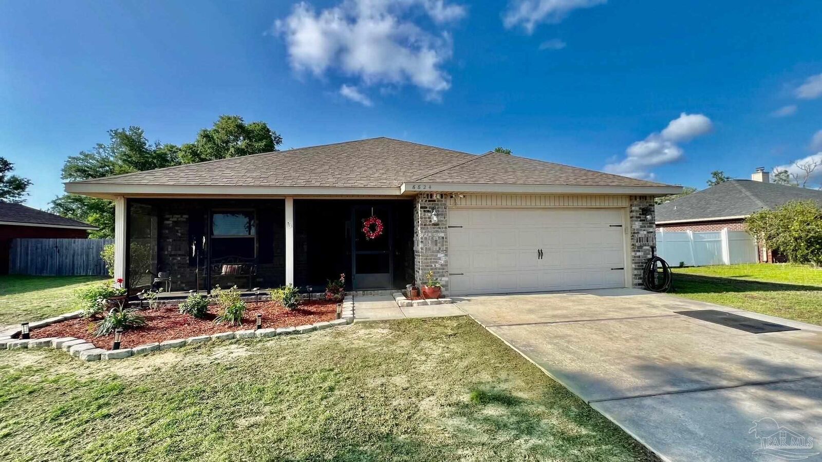 Property Photo:  8824 Longmont Way  FL 32583 