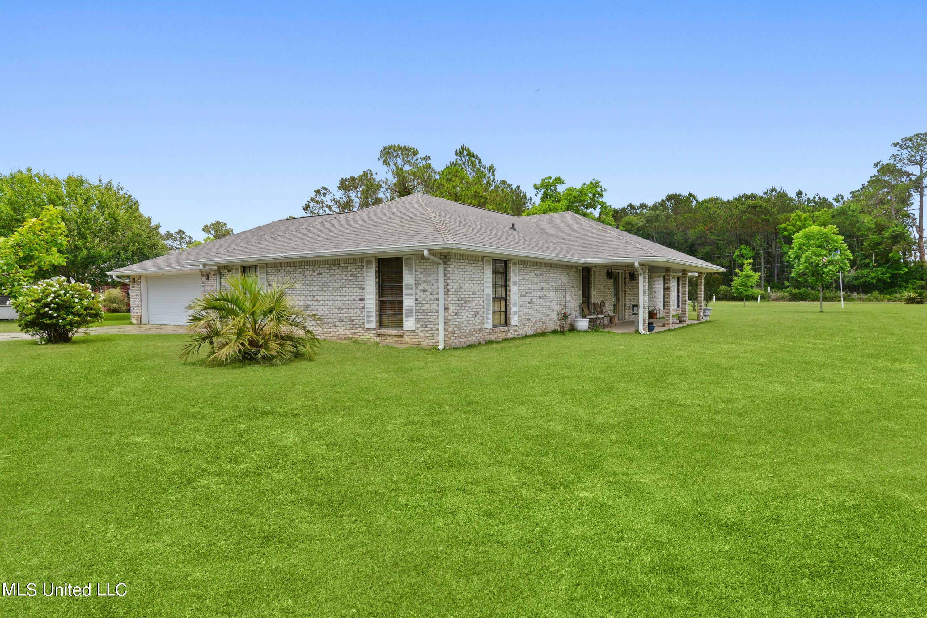 Property Photo:  5680 Lower Bay Road  MS 39520 