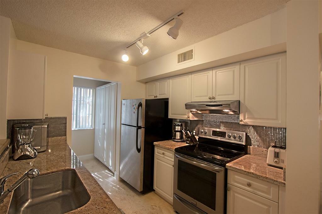 Property Photo:  160 Yacht Club Way 212  FL 33462 