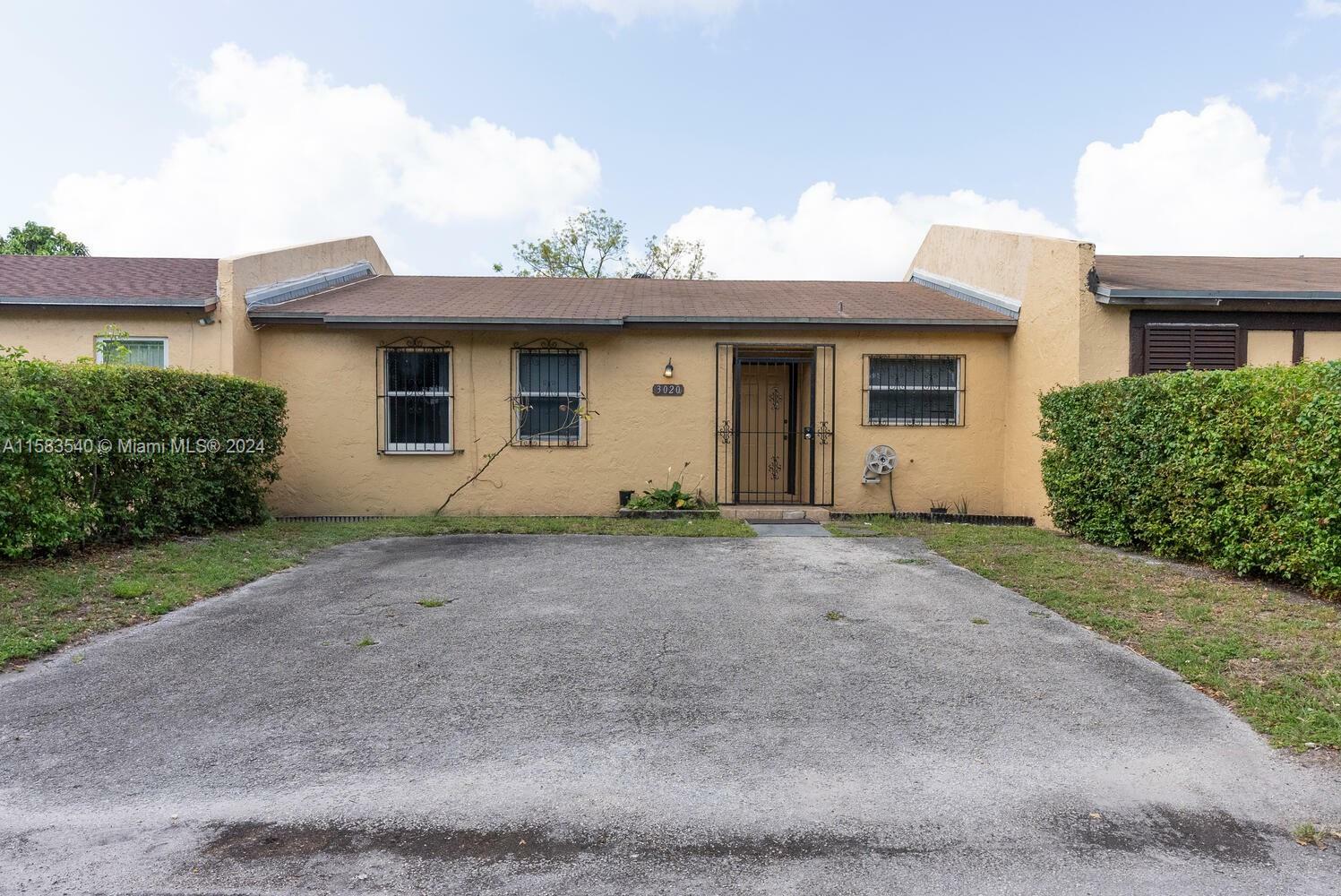 Property Photo:  3020 NW 203rd Ln 3020  FL 33056 