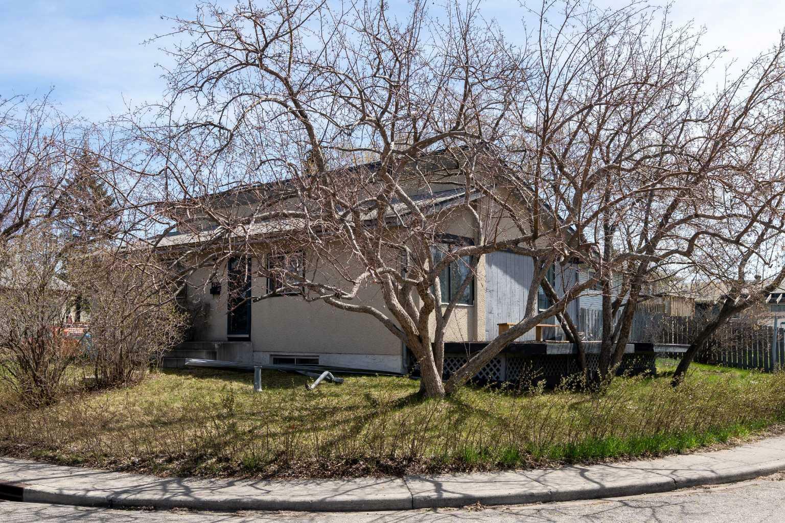 Property Photo: 103 Olympia Drive SE AB T2C 1H6