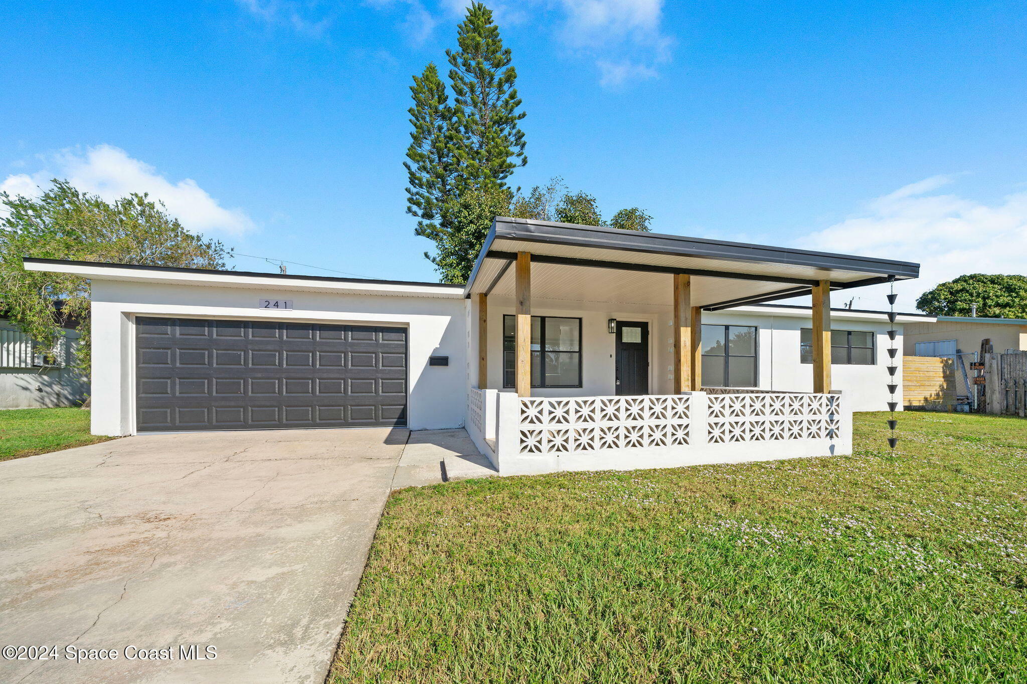 Property Photo:  241 NE 3rd Street  FL 32937 