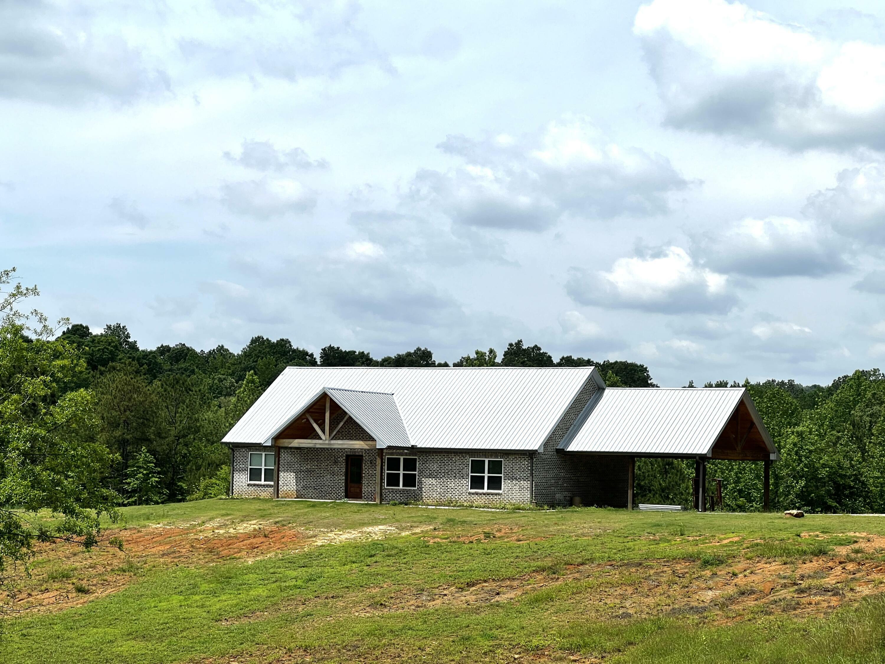 Property Photo:  1061/1063 County Road 222  MS 38828 