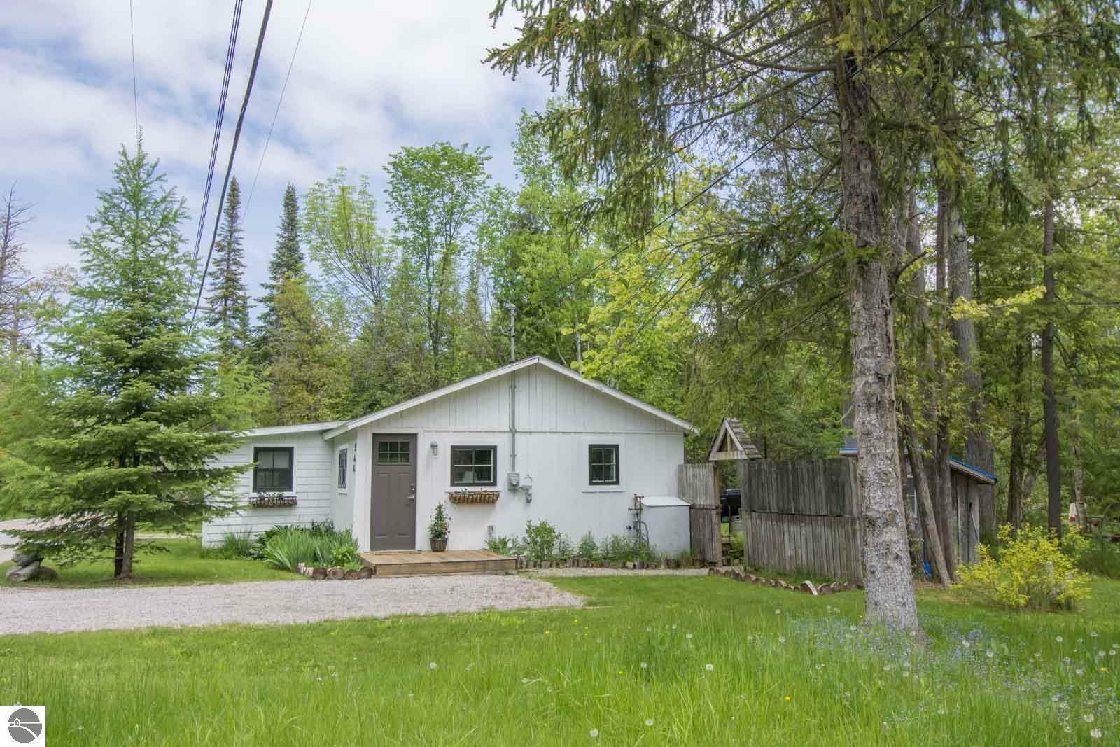 Property Photo:  566 W Traverse Lake Road  MI 49664 