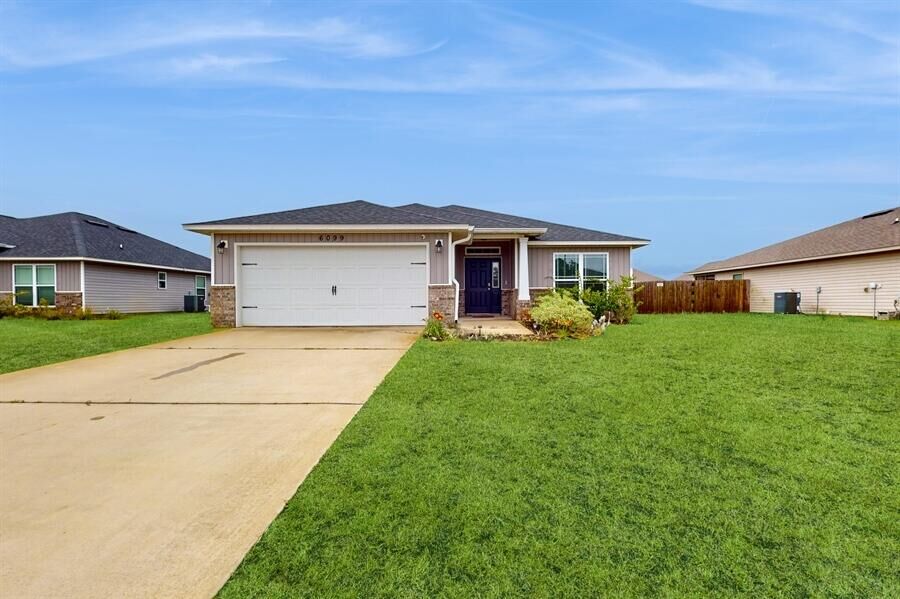 Property Photo:  6099 Redberry Drive  FL 32563 