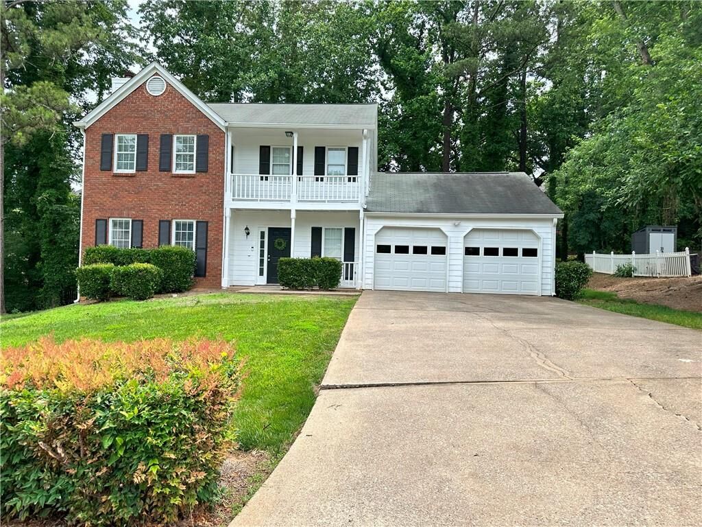 Property Photo:  245 Magnolia Tree Court  GA 30022 