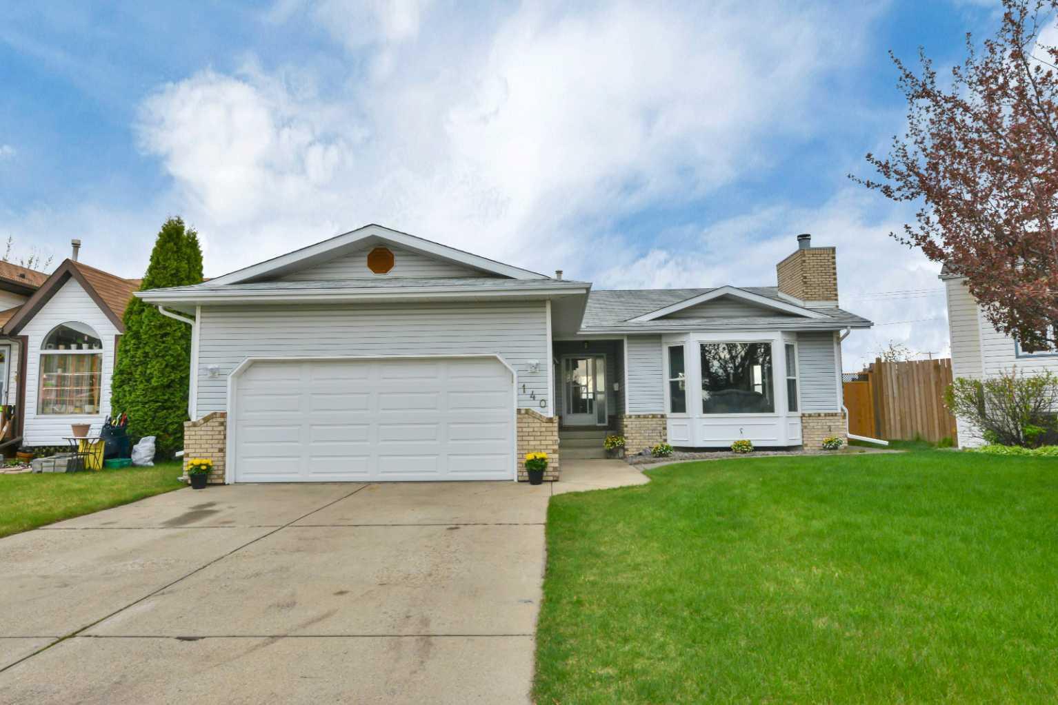 Property Photo: 140 Dixon Crescent AB T4R 2H5