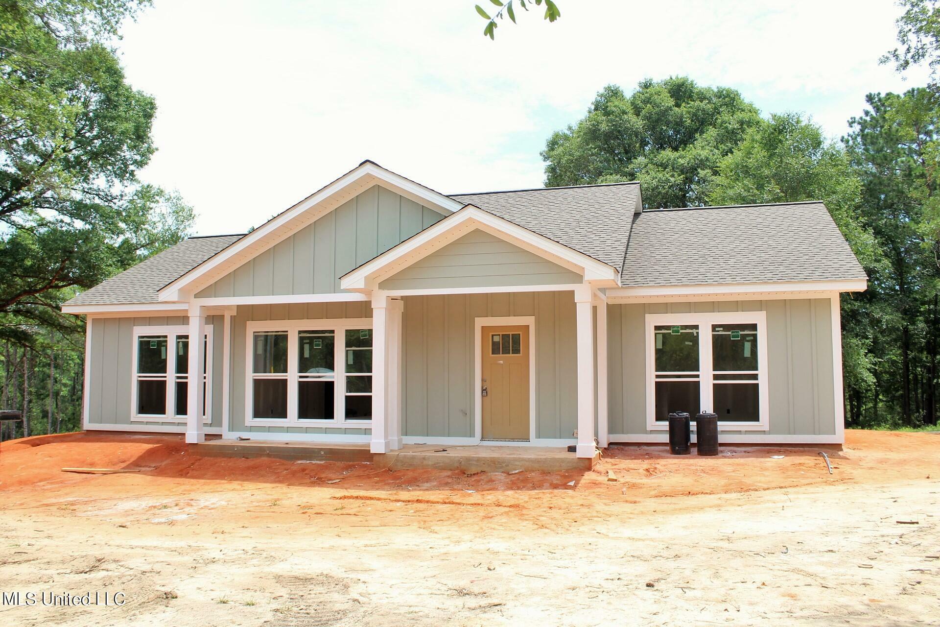 Property Photo:  116 J W Holland  MS 39452 