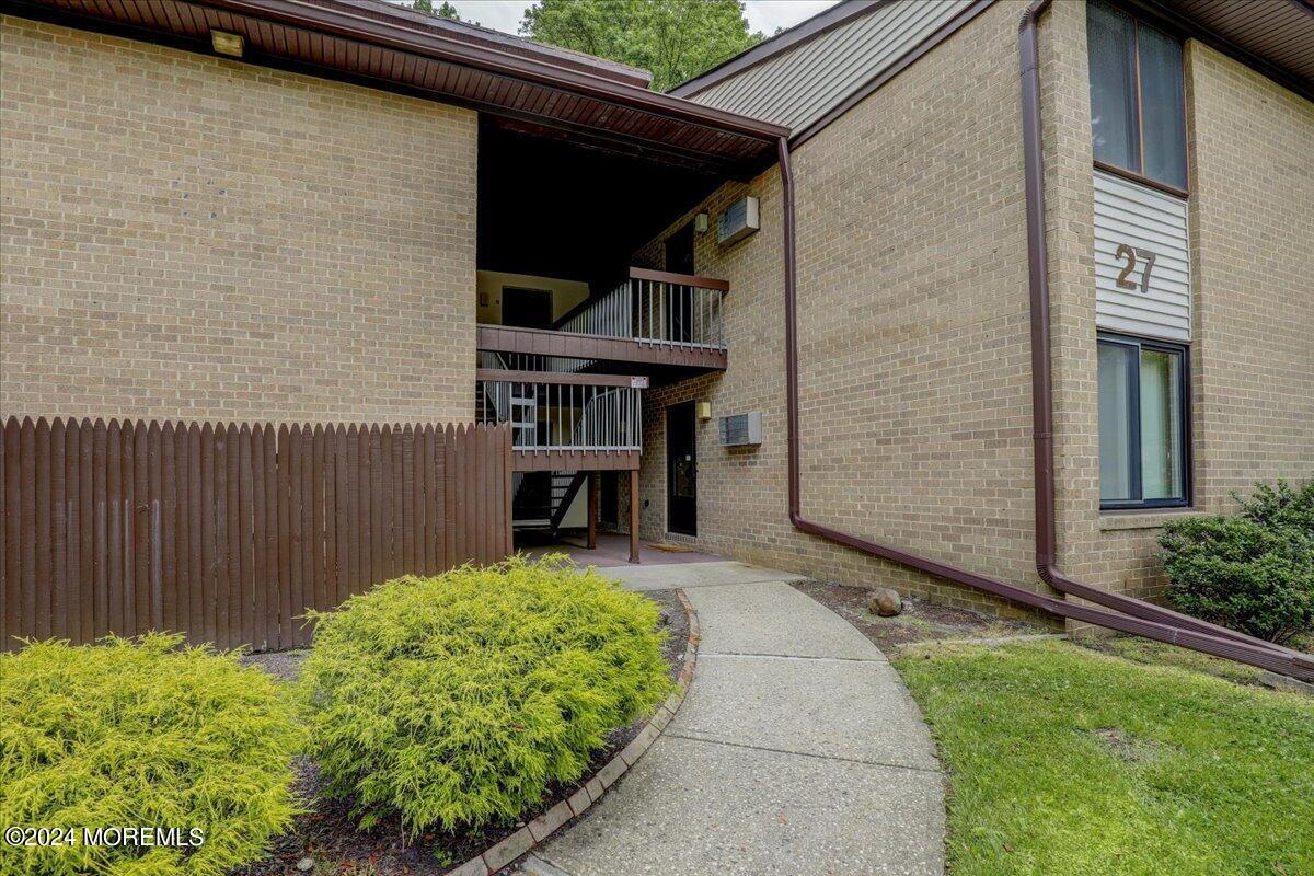 Property Photo: 27 Meadow Green Circle H NJ 07726
