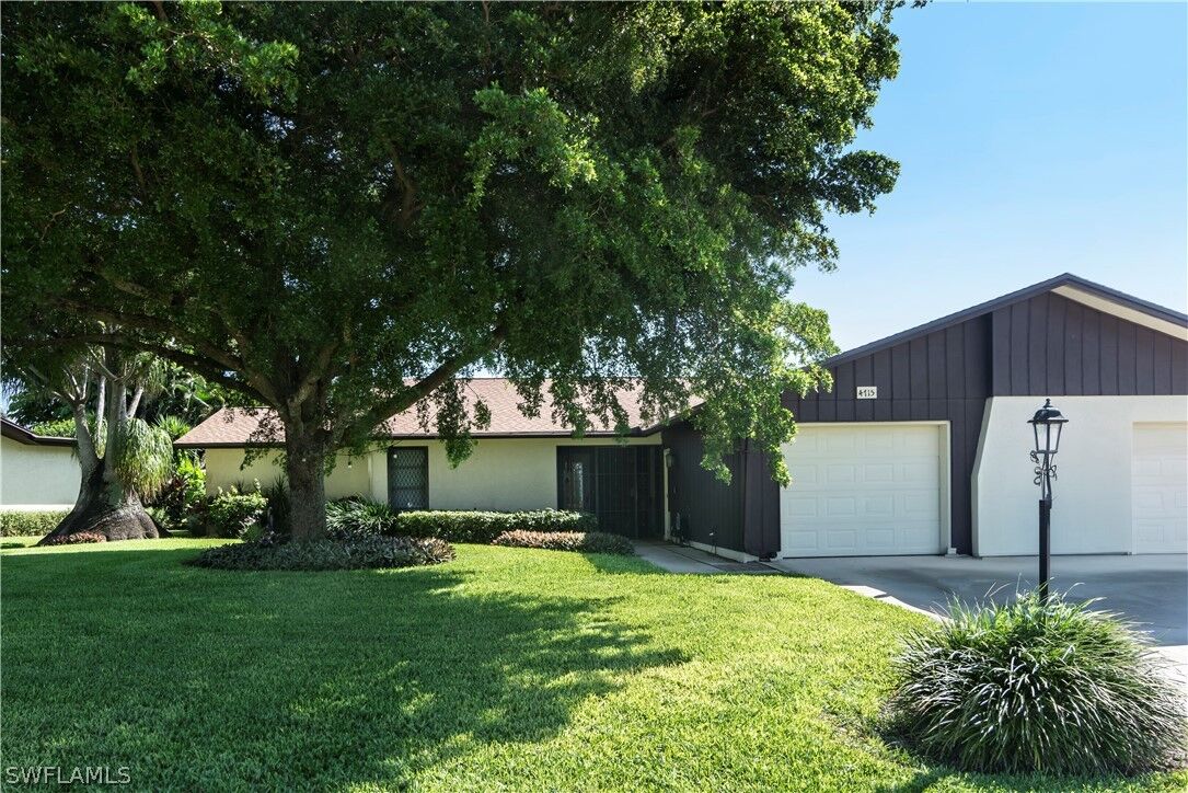 Property Photo: 4715 Lakewood Boulevard J13 FL 34112