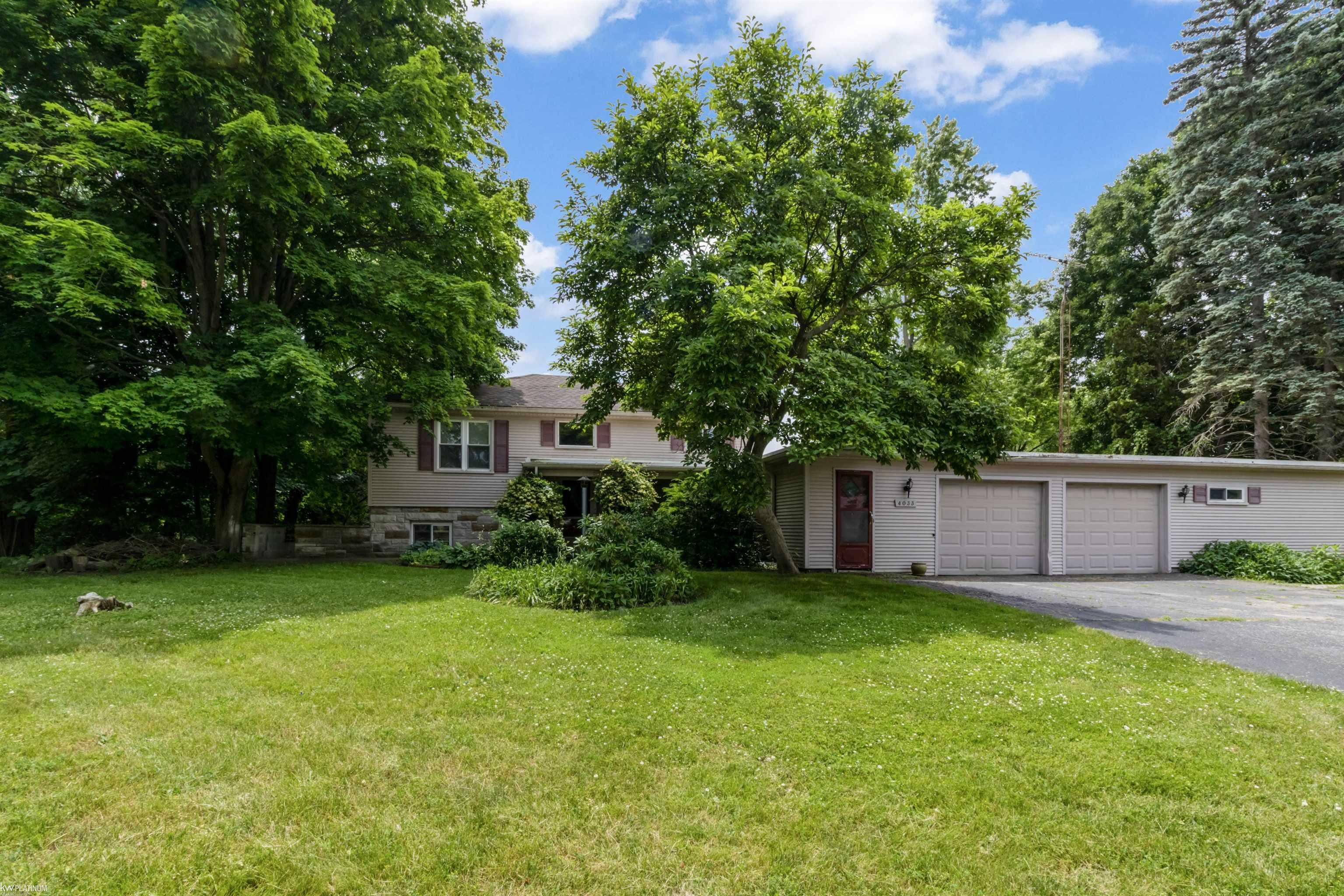 Property Photo:  4033 N River Road  MI 48059 