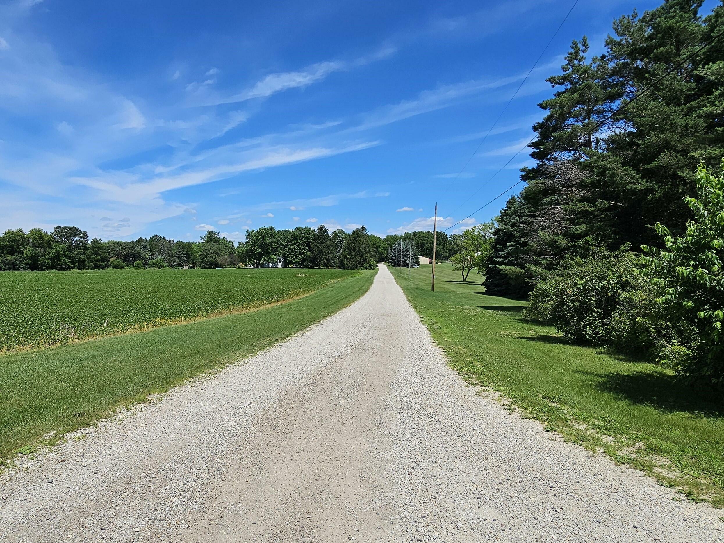 Property Photo:  W240s10240 Castle Rd  WI 53103 