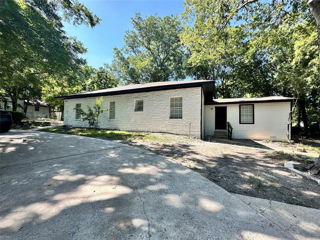 Property Photo:  202 Woodard Street  TX 75442 