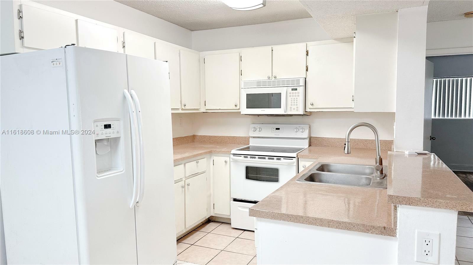 Property Photo:  9491 S Palm Cir S 103  FL 33025 