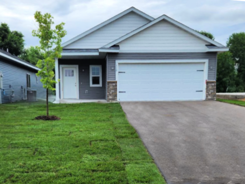 Property Photo:  118 9th Avenue NE  MN 55040 