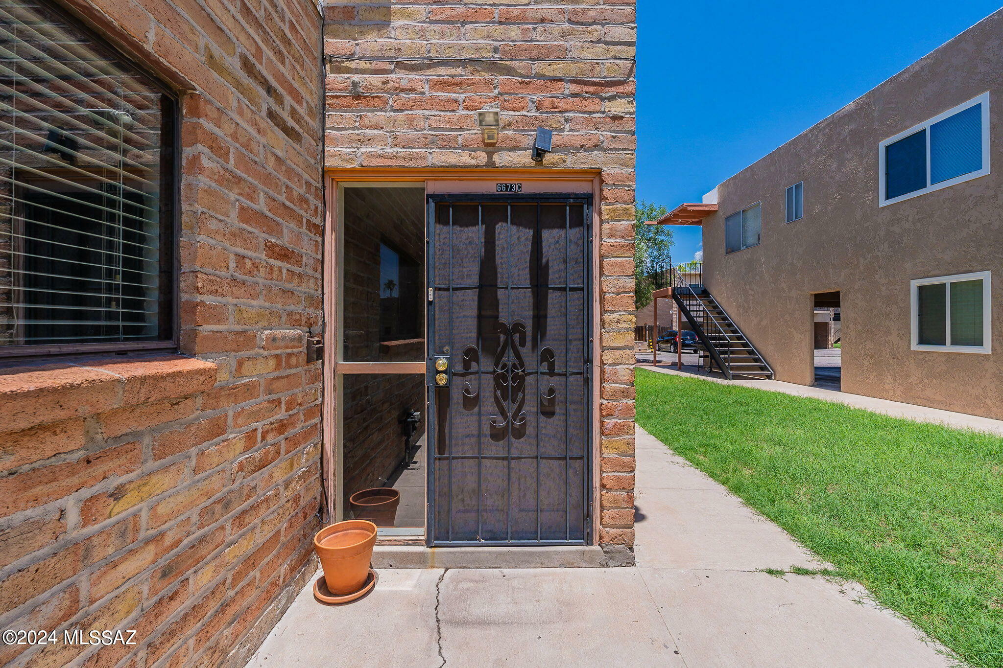 Property Photo:  6673 Calle La Paz C  AZ 85715 