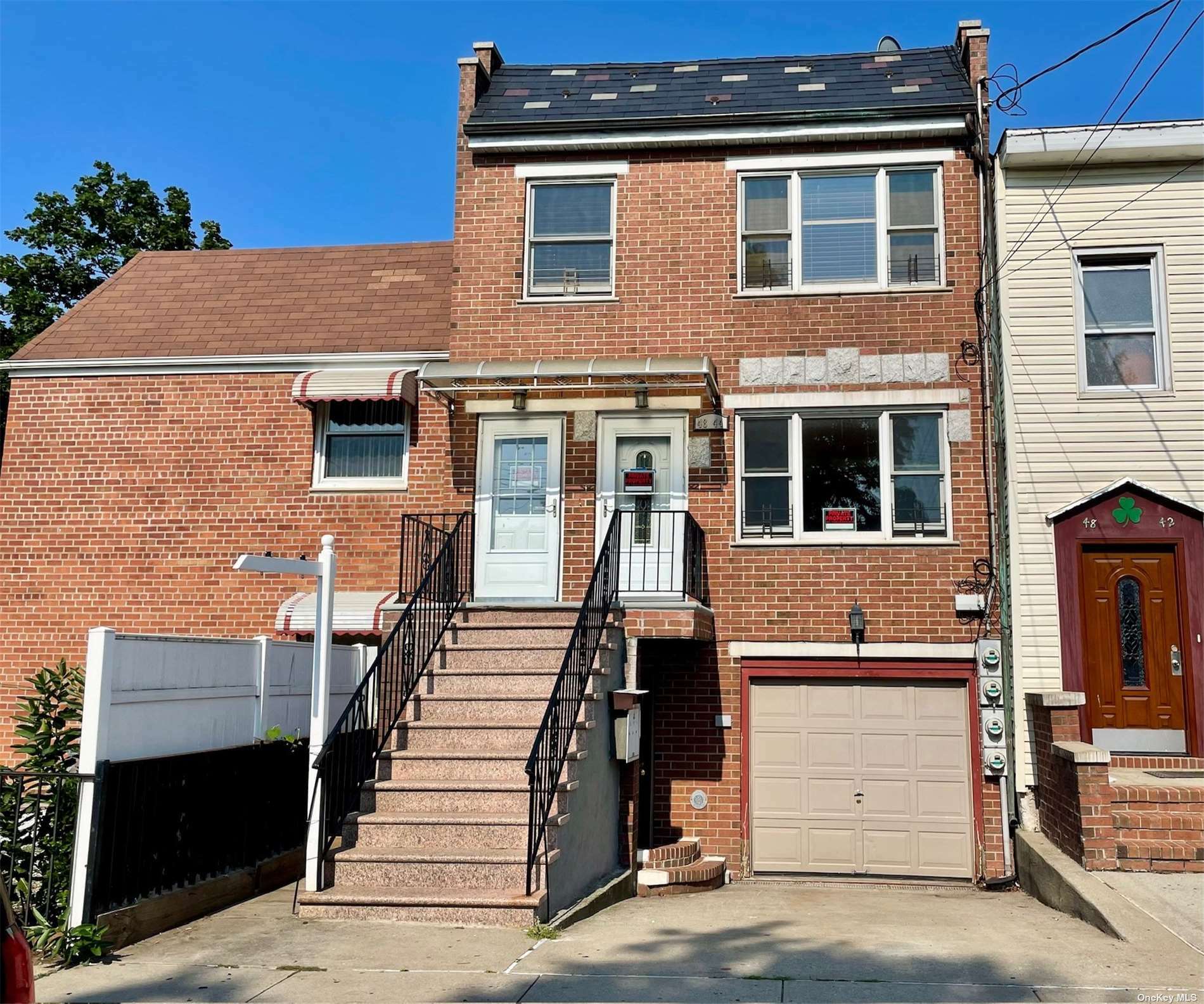 Property Photo: 48-44 65th NY 11377