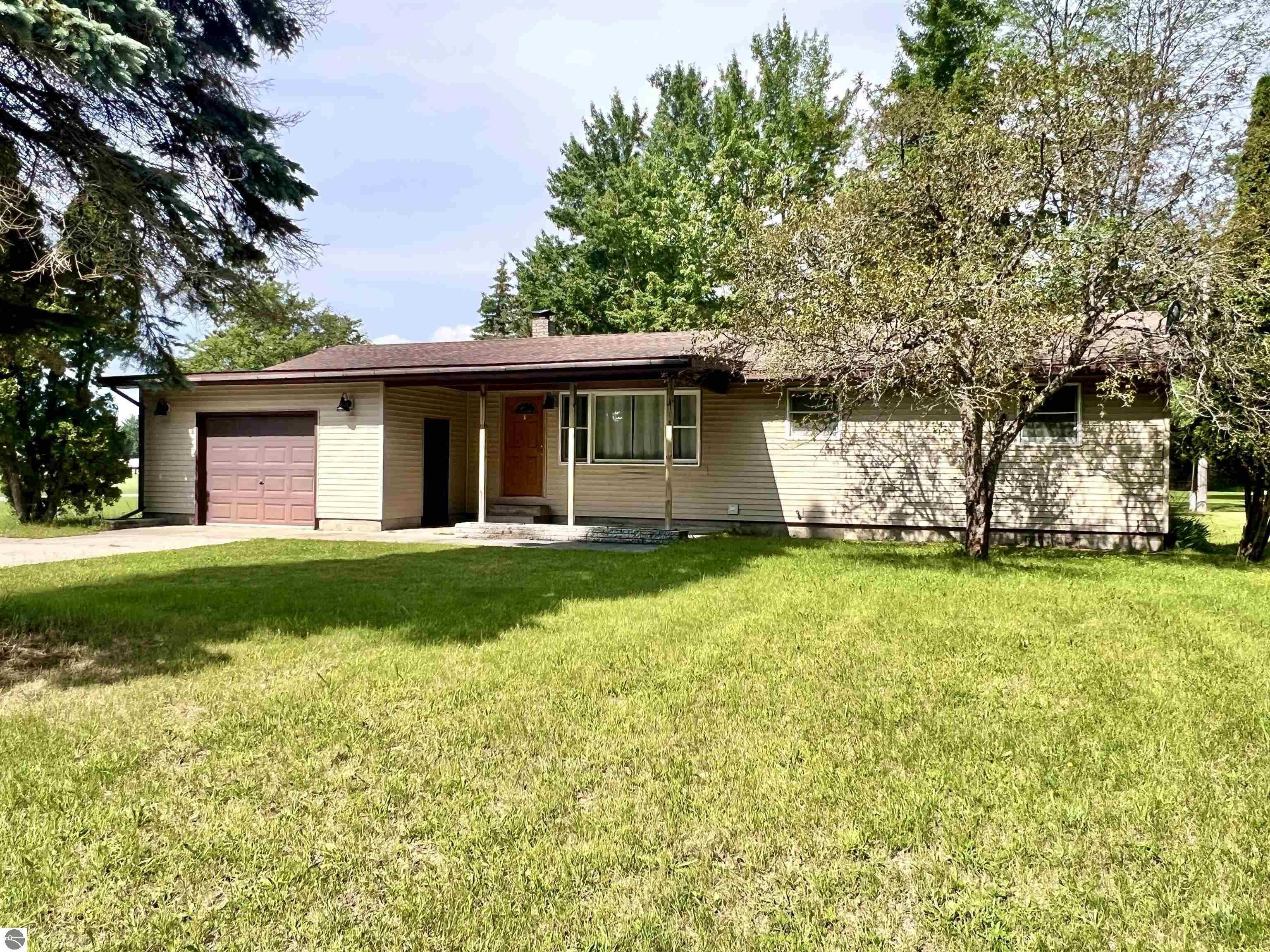 Property Photo:  1021 W Kalkaska Road  MI 49646 