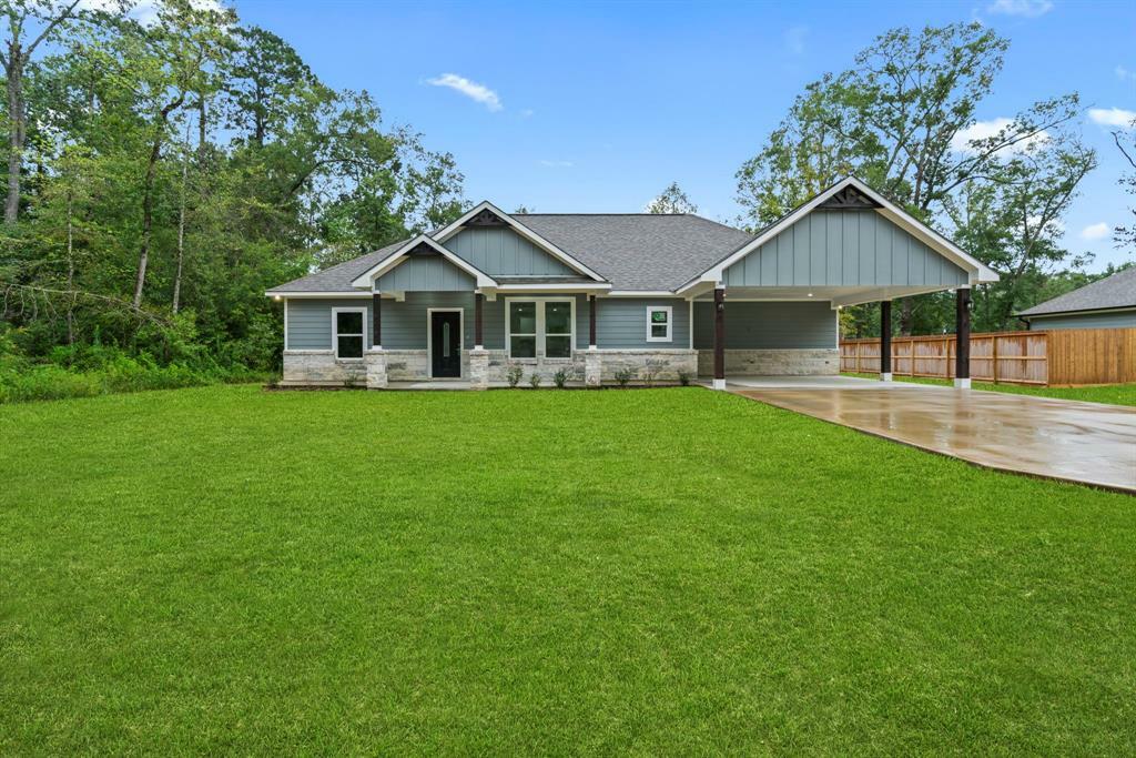 Property Photo:  318 County Road 2221  TX 77327 