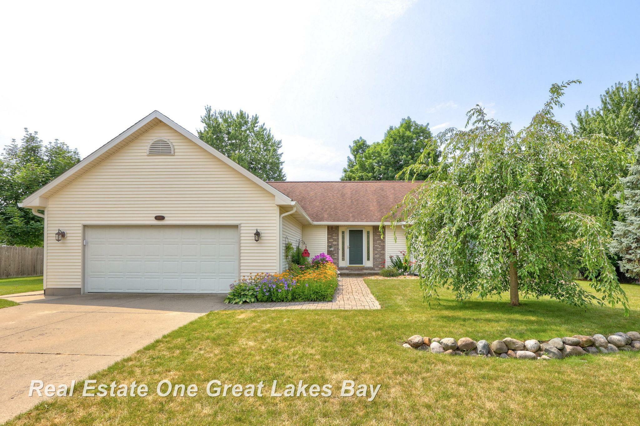 Property Photo:  8891 Swancrest Drive  MI 48609 