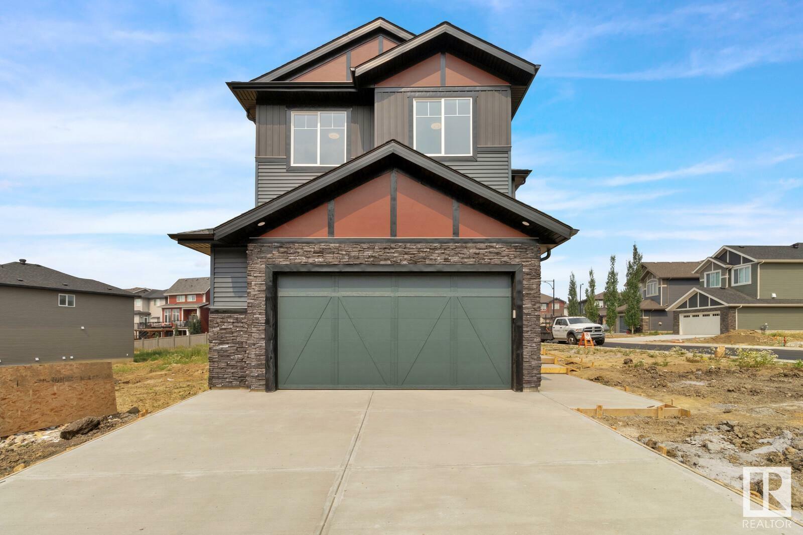 Property Photo:  1138 Gyrfalcon Crescent NW  AB T5S 0H7 