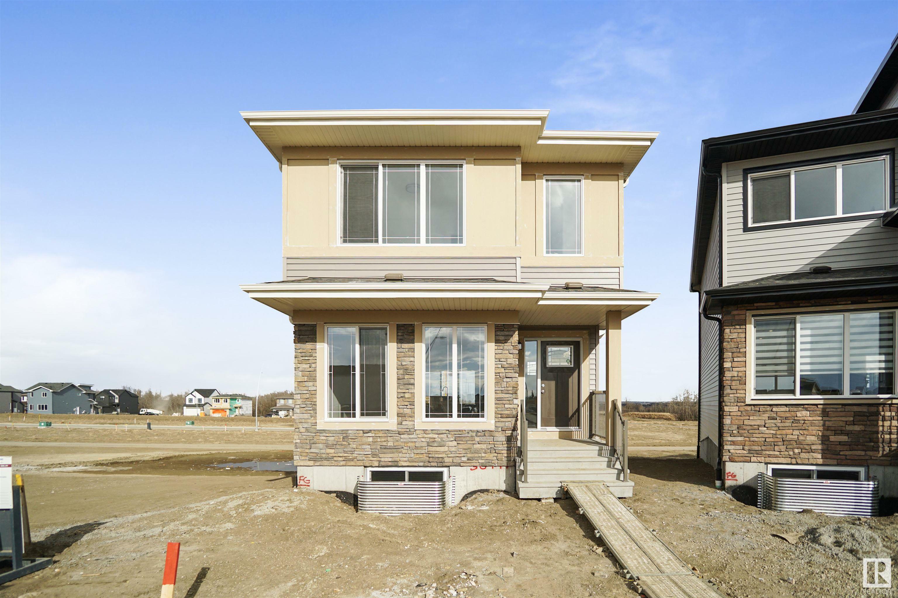 Property Photo:  17307 6 Street NE  AB T5Y 4G1 