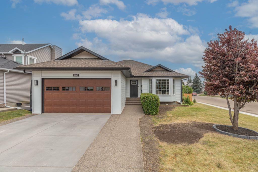 Property Photo: 202 Sunset Place AB T1S 1P3