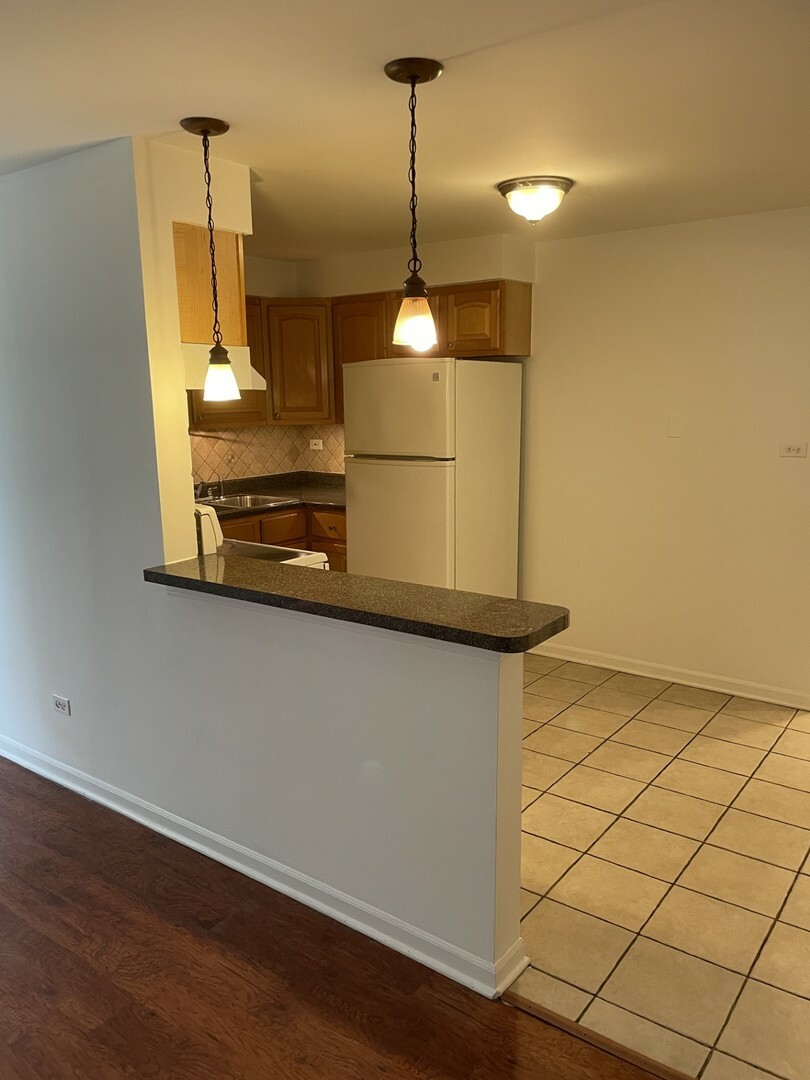 Property Photo:  2330 N Harlem Avenue 1A  IL 60707 