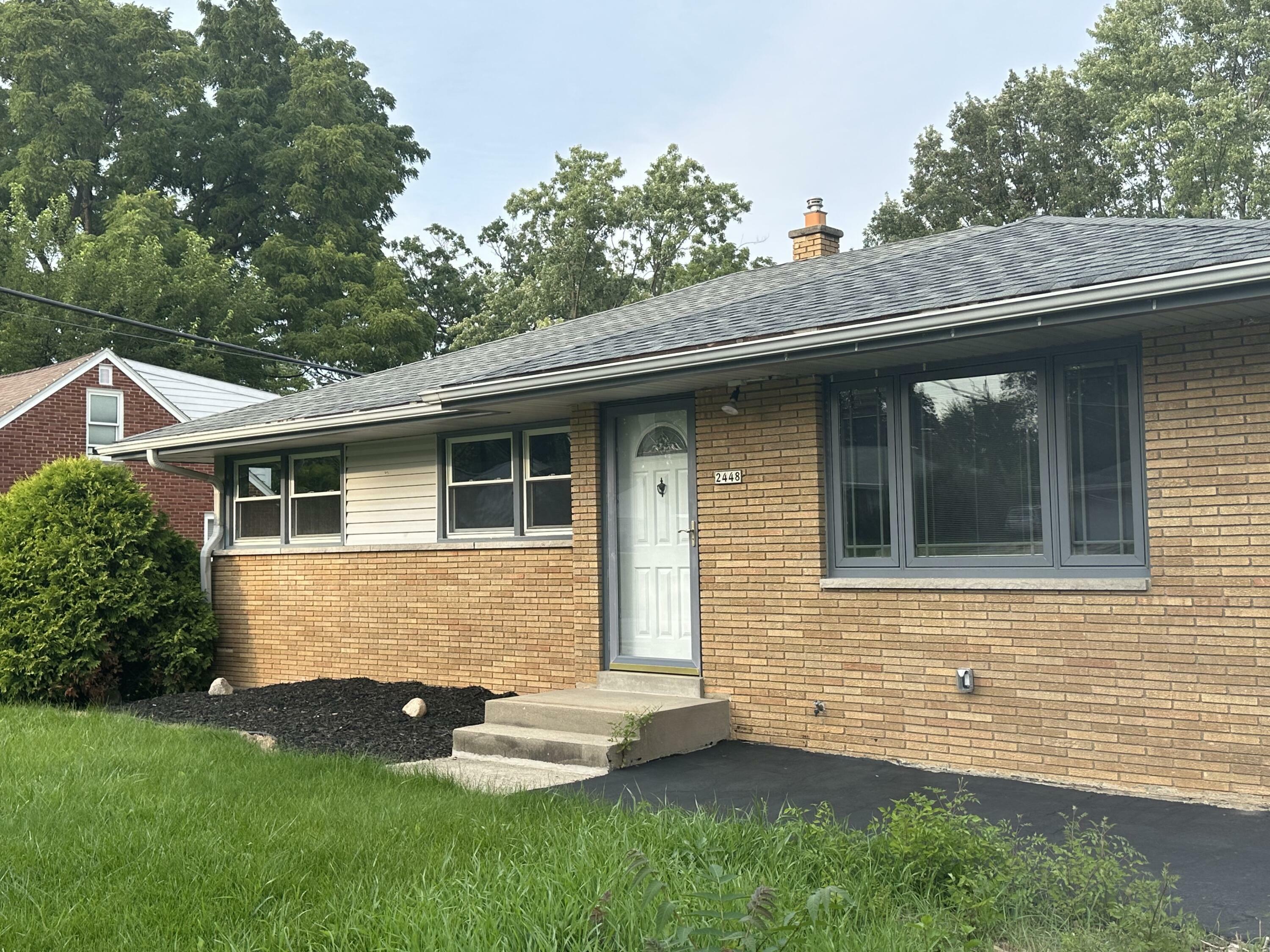 Property Photo:  2448 N 111th St  WI 53226 