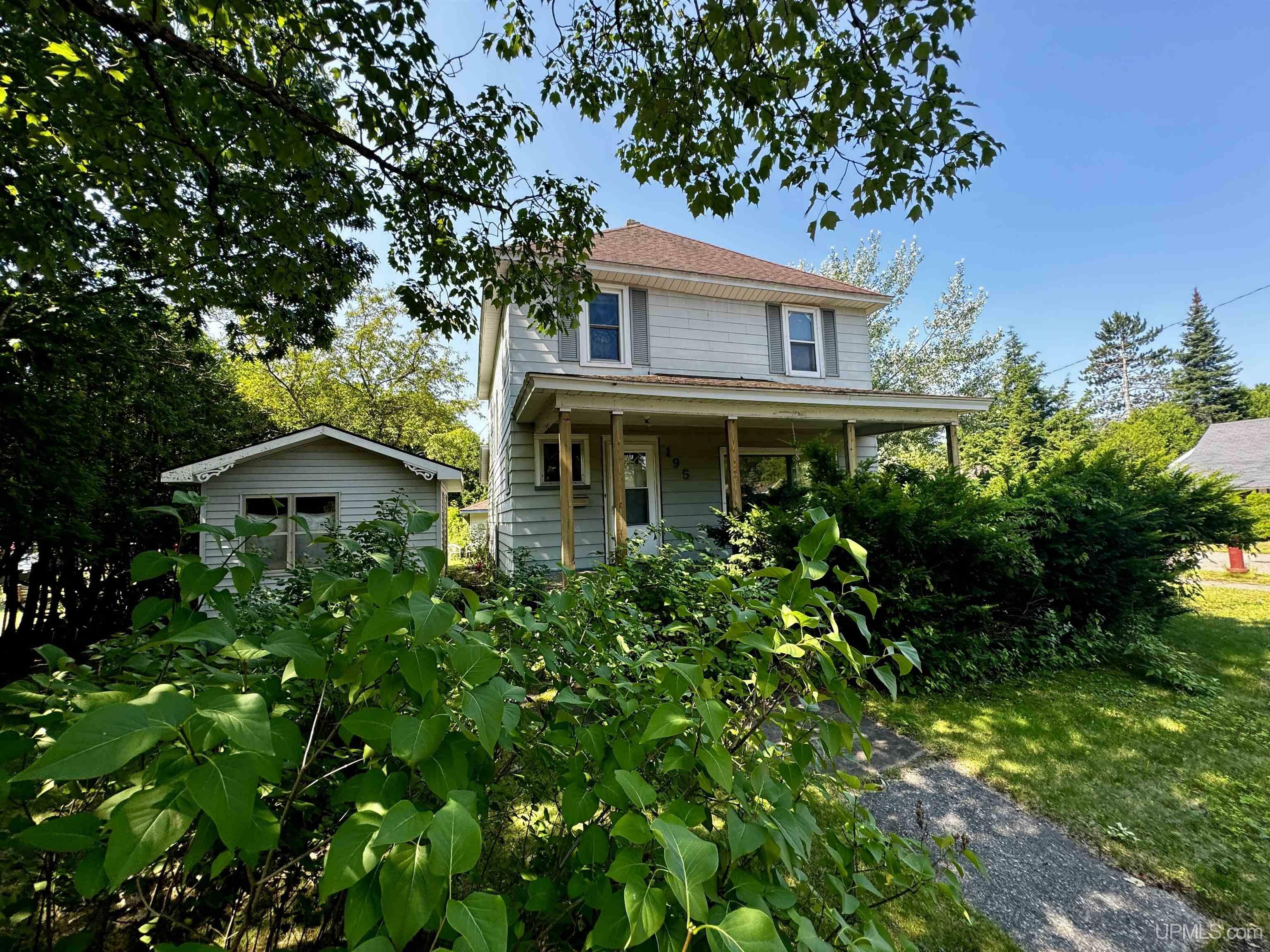 Property Photo:  195 N Oak  MI 49841 